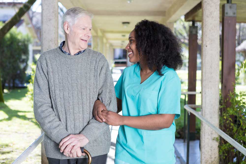 Woman Walking Elderly Gentleman